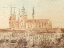 Load image into Gallery viewer, A sepia-toned sketch or print depicting a historic cityscape with a cathedral or church tower, low buildings, and sparse trees in the foreground, rendered in brown and beige tones on a light background.
