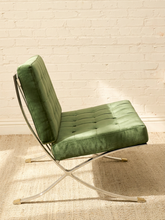 Load image into Gallery viewer, Vintage Barcelona-style lounge chair with olive green button-tufted seat and back, polished metal frame, and support straps
