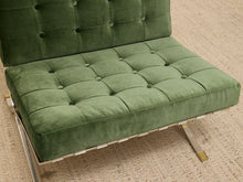 Load image into Gallery viewer, Vintage Barcelona-style lounge chair with olive green button-tufted seat and back, polished metal frame, and support straps
