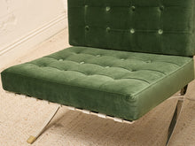 Load image into Gallery viewer, Vintage Barcelona-style lounge chair with olive green button-tufted seat and back, polished metal frame, and support straps
