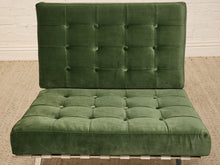 Load image into Gallery viewer, Vintage Barcelona-style lounge chair with olive green button-tufted seat and back, polished metal frame, and support straps
