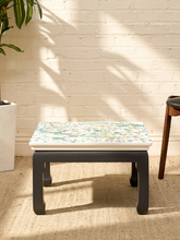 Load image into Gallery viewer, Vintage square side table with abstract green, orange, and yellow splatter-painted top and dark curved-leg base
