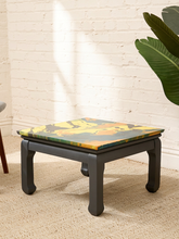 Load image into Gallery viewer, Vintage square side table with swirling yellow, orange, teal, and black marbled abstract top and dark curved-leg base
