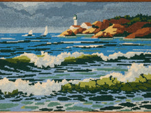 Load image into Gallery viewer, A square needlepoint or cross-stitch style coastal scene with blue ocean waves, white surf, sailboats, a rocky shoreline, and a lighthouse under a cloudy sky.
