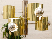 Load image into Gallery viewer, Vintage Space Age chandelier with polished brass cylindrical shades, mirrored chrome spheres, multiple lights, and chain suspension
