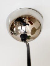 Load image into Gallery viewer, A close-up of a polished chrome dome ceiling light fixture with a black cord extending downward against a plain white background.
