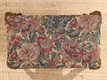 Load image into Gallery viewer, A vintage rectangular tapestry box with a floral and bird pattern, featuring pink and red roses, blue birds, and green leaves on a beige background, finished with bronze metal corner brackets.
