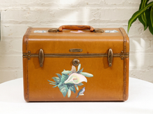 Load image into Gallery viewer, Vintage Samsonite caramel brown train case with painted floral decorations, top handle, metal latches, and central lock
