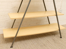 Load image into Gallery viewer, A two-tier wooden bookshelf with light natural wood shelves and dark gray metal legs, set against a white brick wall and beige woven rug.
