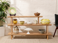 Load image into Gallery viewer, Vintage three-tier natural wood display shelf with long staggered shelves, rounded edges, slender dowel supports, and visible wood grain
