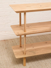 Load image into Gallery viewer, Vintage three-tier natural wood display shelf with long staggered shelves, rounded edges, slender dowel supports, and visible wood grain
