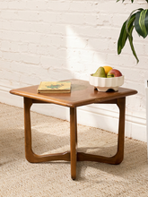 Load image into Gallery viewer, Distressed Mid-Century Lane wood side table with rounded square top, circular decorative detail, curved legs, and crossed base
