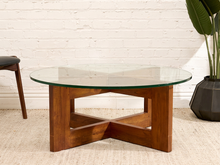 Load image into Gallery viewer, Crate &amp; Barrel chunky sculptural coffee table with round clear glass top and intersecting geometric wood base
