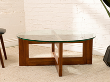 Load image into Gallery viewer, Crate &amp; Barrel chunky sculptural coffee table with round clear glass top and intersecting geometric wood base
