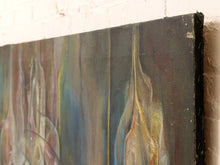 Load image into Gallery viewer, An abstract canvas painting with vertical brushstrokes in muted blue, gray, brown, cream, and touches of yellow and red, shown hanging against a white brick wall.
