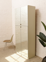 Load image into Gallery viewer, Postmodern tall four-door storage cabinet with full-length mirrored fronts and multiple interior shelves

