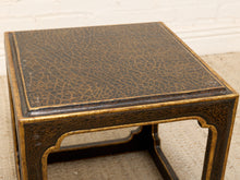 Load image into Gallery viewer, A square side table with a dark brown and gold crackled finish, featuring a traditional Chinese-style leg design and a textured top surface.
