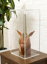 Load image into Gallery viewer, Carved wood unicorn head sculpture with ornate metallic spiral horn displayed inside a clear rectangular acrylic case
