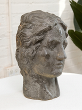 Load image into Gallery viewer, Vintage classical female head sculpture with intricately styled hair, dark textured finish, and weathered aged surface
