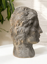 Load image into Gallery viewer, Vintage classical female head sculpture with intricately styled hair, dark textured finish, and weathered aged surface

