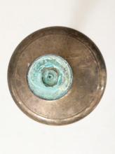 Load image into Gallery viewer, Top-down view of a circular bronze-toned metal base or lid with a central round inset showing a turquoise-green oxidized or patinated surface, photographed on a plain white background.
