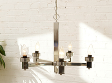 Load image into Gallery viewer, Vintage chrome-tone five-arm Sputnik chandelier with geometric rectangular arms, exposed candle-style bulbs, central column, chain, and ceiling canopy
