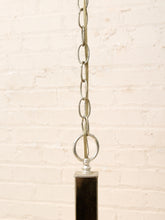 Load image into Gallery viewer, Modern floor lamp with a round glass shade on a white background
