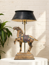 Load image into Gallery viewer, Vintage equestrian table lamp with sculptural horse figure, aged textured base, brass-tone stem, and large black flared shade
