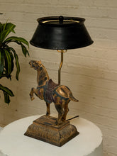 Load image into Gallery viewer, Vintage equestrian table lamp with sculptural horse figure, aged textured base, brass-tone stem, and large black flared shade
