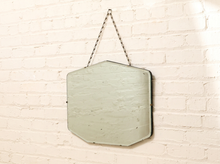 Load image into Gallery viewer, Vintage frameless Art Deco mirror with beveled edges, clipped geometric corners, and visible aged patina
