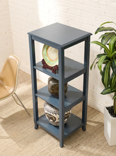 Load image into Gallery viewer, Vintage navy blue wooden display shelf featuring four open storage levels, a compact vertical silhouette, and a classic painted finish.
