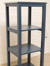 Load image into Gallery viewer, Vintage navy blue wooden display shelf featuring four open storage levels, a compact vertical silhouette, and a classic painted finish.
