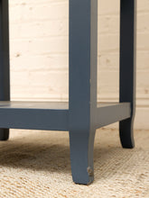 Load image into Gallery viewer, Vintage navy blue wooden display shelf featuring four open storage levels, a compact vertical silhouette, and a classic painted finish.
