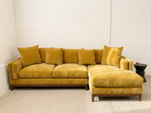 Load image into Gallery viewer, Lisette Sofa with Chaise in Sacramento Honey featuring golden mustard upholstery, plush seat cushions, coordinating pillows, wide arms, and wood legs

