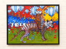 Load image into Gallery viewer, Colorful folk art painting of a dog carrying an owl with penguins and hot-air balloons against a vivid red, blue, yellow, and green landscape

