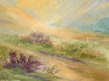 Load image into Gallery viewer, Watercolor landscape painting of a rolling field with soft hills, distant blue mountains, and a warm golden sky.
