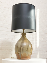 Load image into Gallery viewer, Vintage table lamp with rounded earthy brown and gray drip-glaze base and large black drum shade
