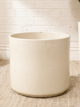 Load image into Gallery viewer, Vintage blush pink cylindrical planter with simple rounded sides, open top, and softly aged finish
