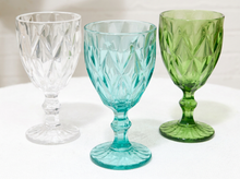 Load image into Gallery viewer, Three cut-glass goblets with diamond patterns in clear, turquoise, and green, arranged on a white surface against a light background.
