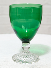 Load image into Gallery viewer, Vintage emerald green glassware set with green goblets on clear textured pedestal stems and coordinating handled green glass pitcher
