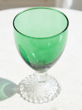 Load image into Gallery viewer, Vintage emerald green glassware set with green goblets on clear textured pedestal stems and coordinating handled green glass pitcher
