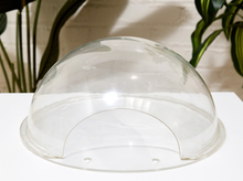 Load image into Gallery viewer, Vintage clear acrylic dome display cover with large rounded transparent form and visible signs of age and use
