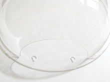 Load image into Gallery viewer, A close-up of a clear transparent plastic or acrylic bowl base with two small tab-like details on the bottom rim, photographed on a white background.
