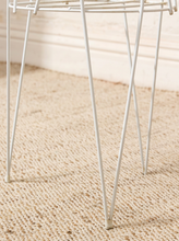 Load image into Gallery viewer, Vintage white painted metal plant stand with open circular wire frame, curved decorative supports, and four slender legs
