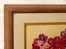 Load image into Gallery viewer, Vintage framed floral still life painting depicting red, pink, and burgundy flowers in a dark rounded vase, with green leaves and a wood frame featuring a textured border and gold trim

