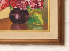 Load image into Gallery viewer, Vintage framed floral still life painting depicting red, pink, and burgundy flowers in a dark rounded vase, with green leaves and a wood frame featuring a textured border and gold trim
