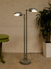 Load image into Gallery viewer, Vintage double-head floor lamp with two adjustable gray metal dome shades, tall slender posts, and round metal base
