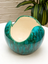 Load image into Gallery viewer, Vintage sculptural ceramic bowl with organic curved rim, turquoise and deep teal glazed exterior, and cream crackle-finish interior

