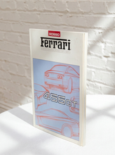 Load image into Gallery viewer, Vintage Rosso Ferrari official magazine featuring illustrated Ferrari 456 GT sports cars and raised 456 GT lettering on the cover
