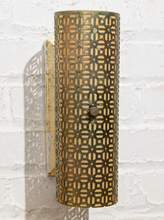 Load image into Gallery viewer, Pair of vintage 1960s metal wall sconces with curved half-cylinder shades, repeating geometric cutout patterns, and rectangular wall mounts
